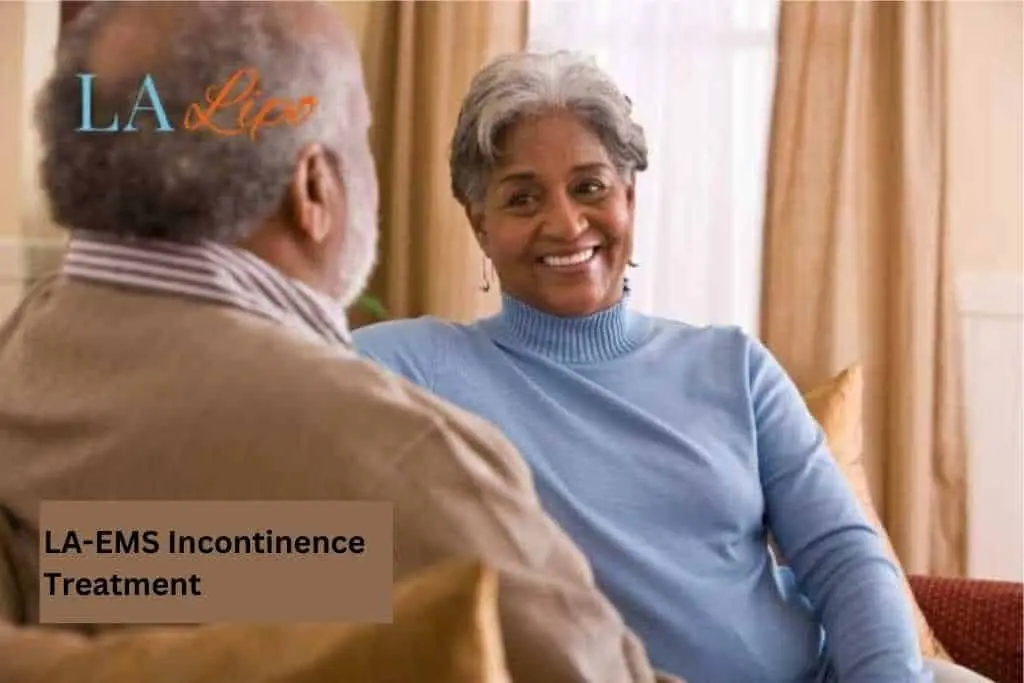 Couple sat smiling at each other - LA-EMS treatment Hounslow