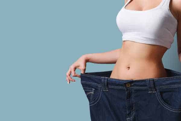 woman after fat reduction treatment Hounslow