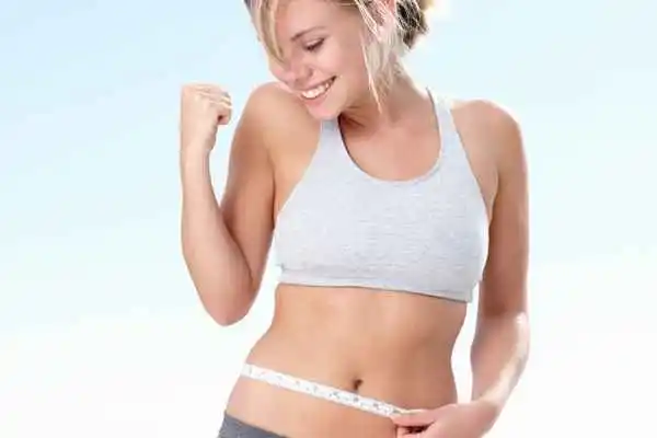 woman happy after fat reduction treatment Hounslow
