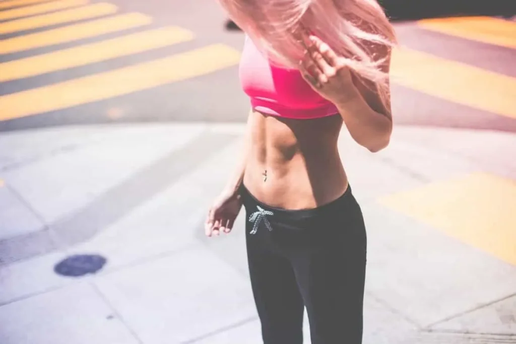 Woman with toned stomach after LA-EMS Body Sculpting Treatment Hounslow 